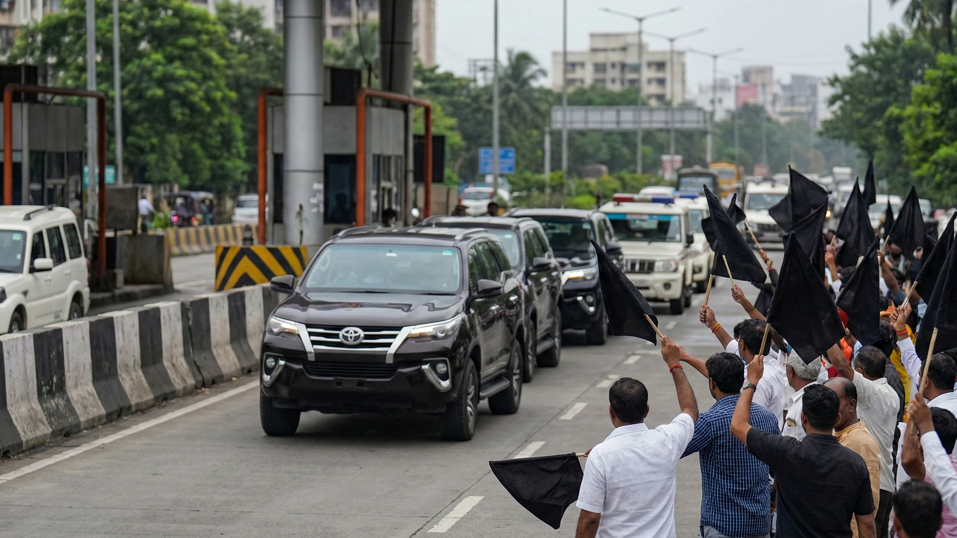 Three men using computers at an office in Ghana