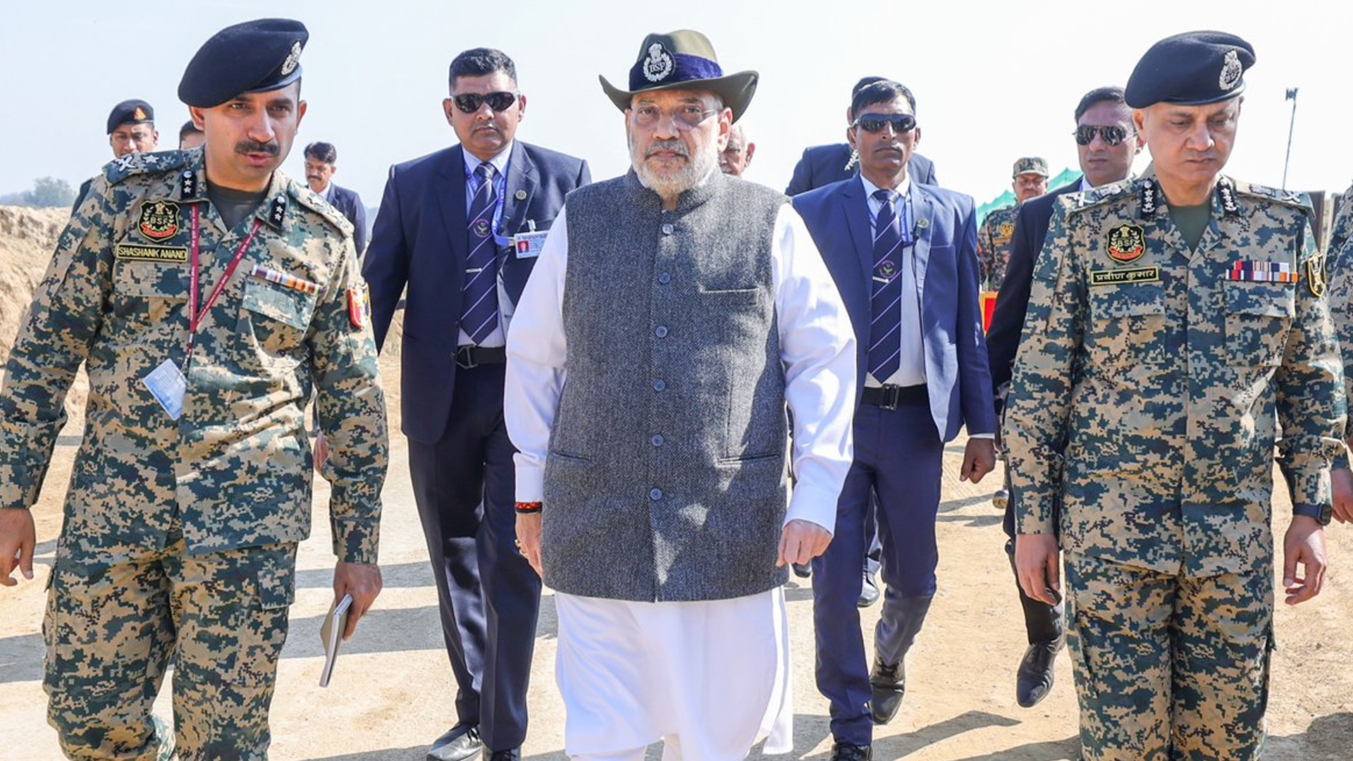 Three men using computers at an office in Ghana