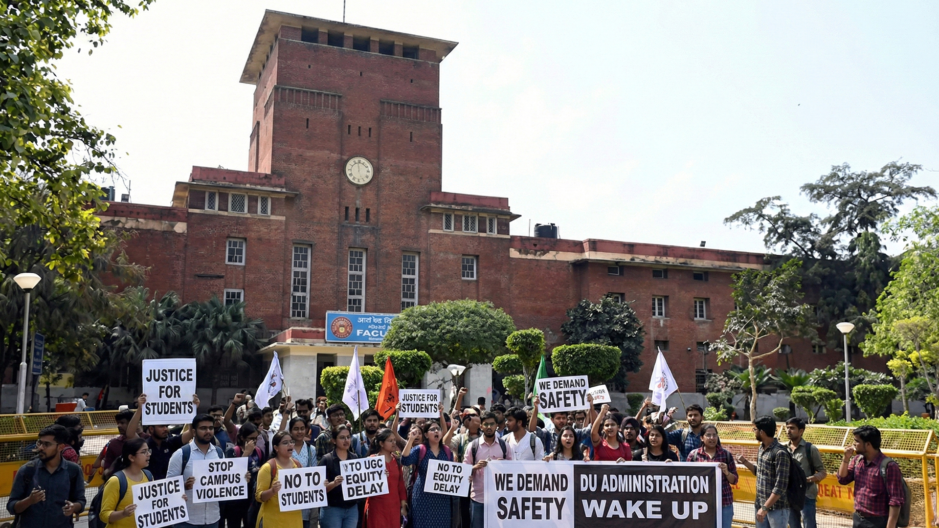 Three men using computers at an office in Ghana