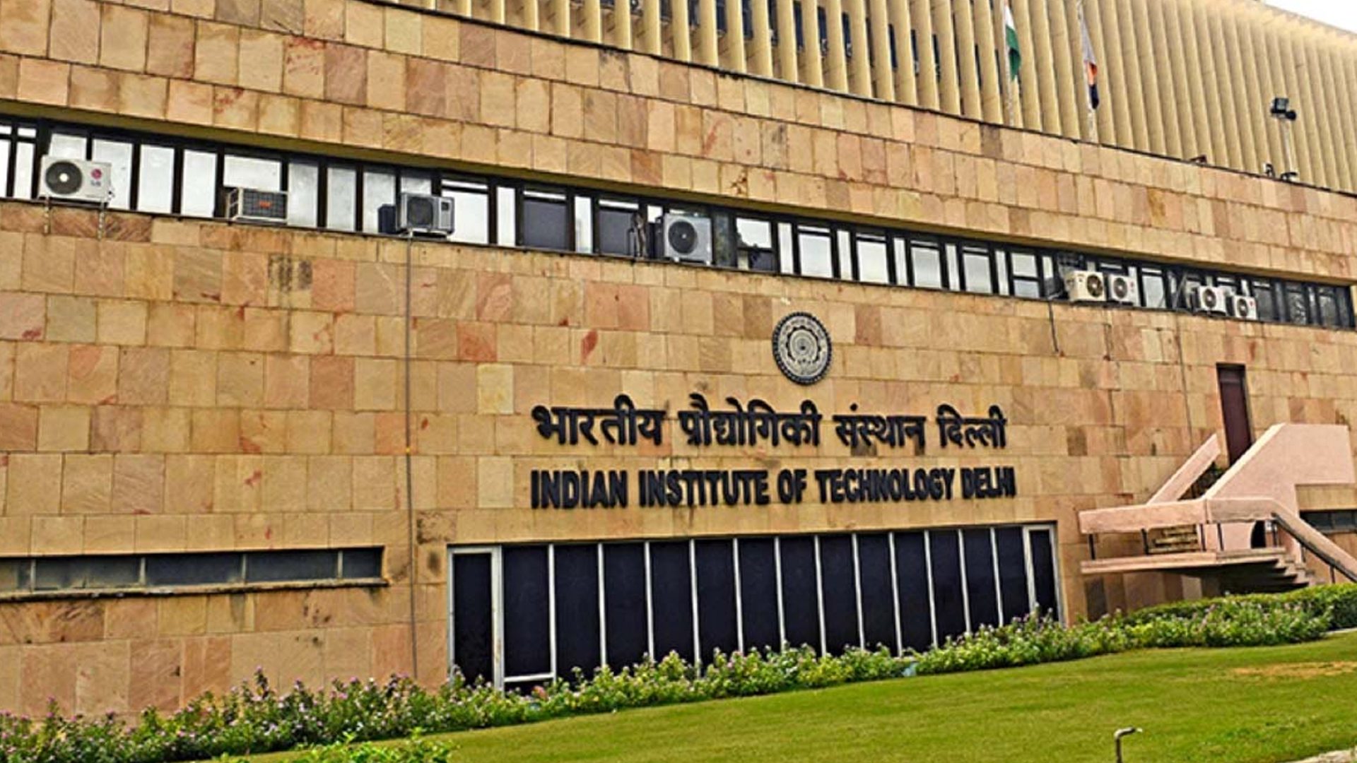 Three men using computers at an office in Ghana