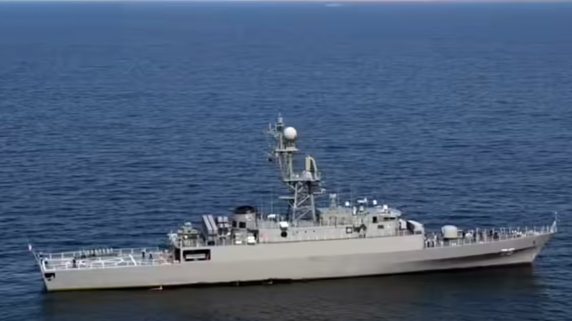 Three men using computers at an office in Ghana