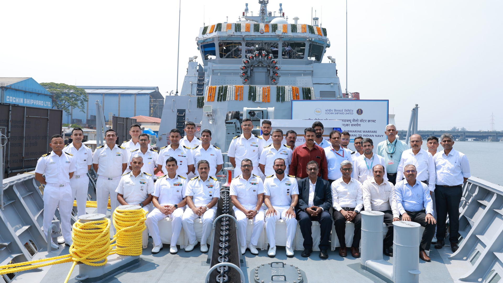 Three men using computers at an office in Ghana